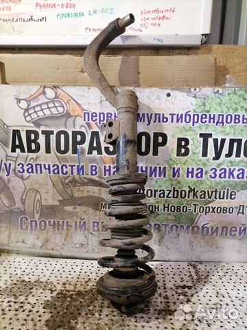 Стойка амортизатора переднего правого Mazda Xedos