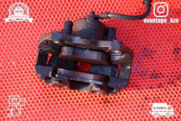 Суппорт тормозной передний правый Opel Astra H