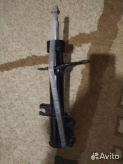 Стойка передняя правая nissan almera classic