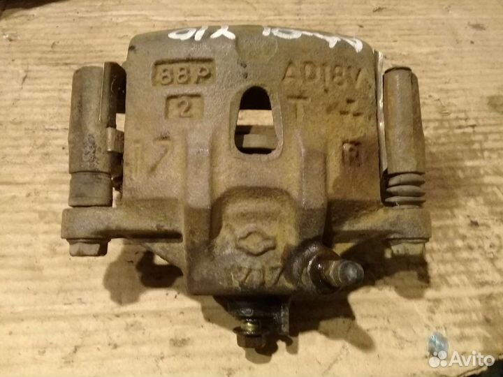 Суппорт правый Nissan AD Y10 1997г