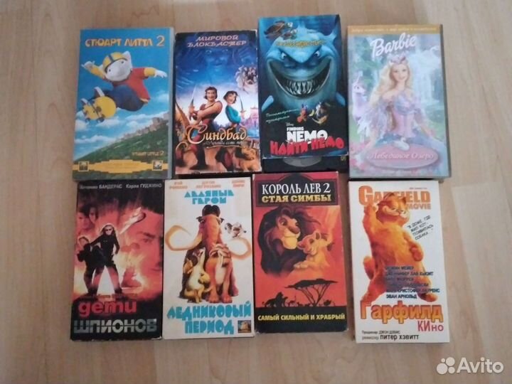 Видеокассеты с мультиками и фильмы