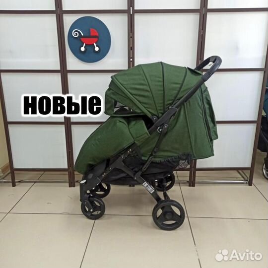 Прогулочная коляска чемодан темно зеленый черная