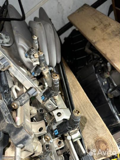 Топливная рампа с форсунками Geely Emgrand EC7