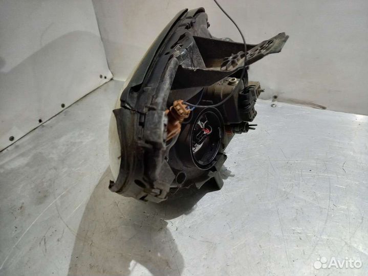 Фара левая renault scenic 1 7701047604