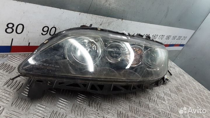 Фара левая Mazda 6 GG рест. 2006
