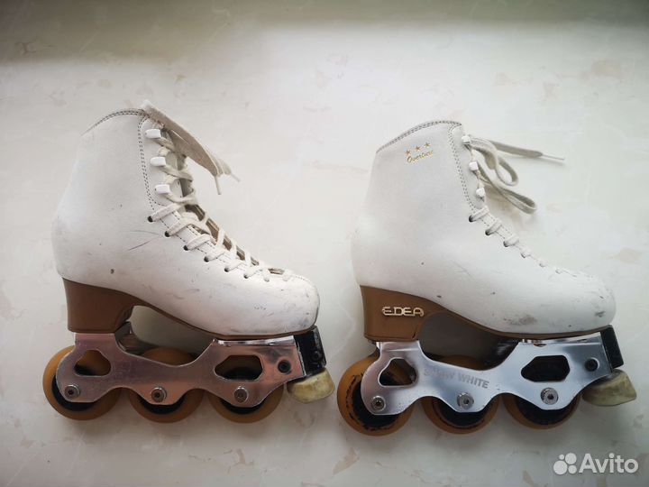 Роликовые коньки