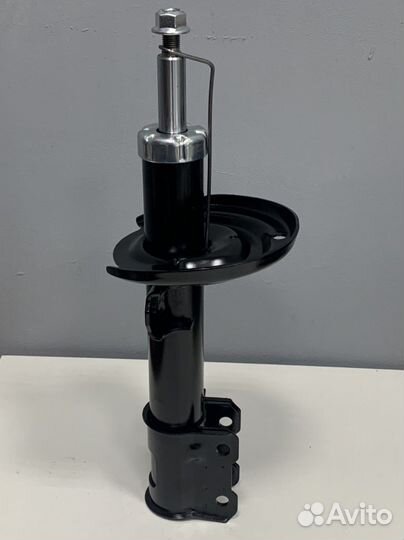 Стойка амортизатор передняя Opel Astra H Zafira B