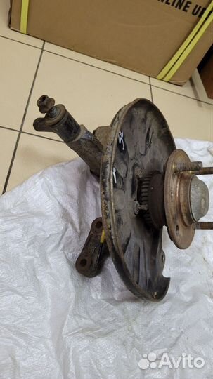 Кулак задний левый на хендай элантра xd