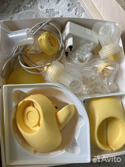 Молокоотсос medela электрический