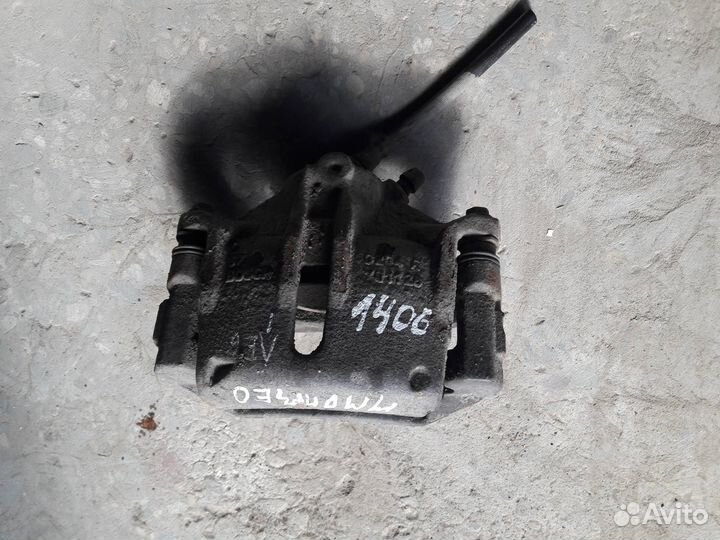 Суппорт тормозной передний левый Ford Mondeo