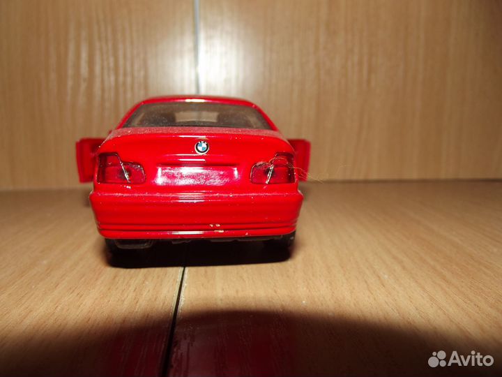 Модель бмв 1:32 new ray, 2000г