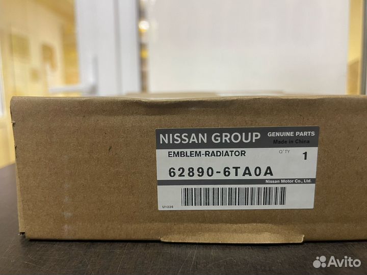 Nissan 628906TA0A логотип