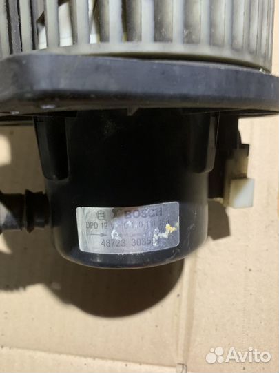 Моторчик отопителя Nissan Primera P11