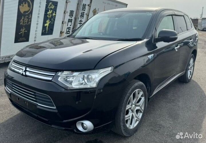 Лючок бензобака задний Mitsubishi Outlander