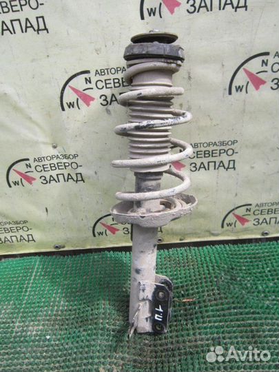 Амортизатор передний левый Opel Astra J A16XER