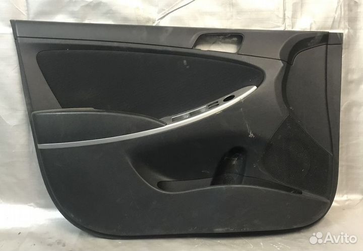 Обшивка двери передней левой Hyundai Solaris I (20