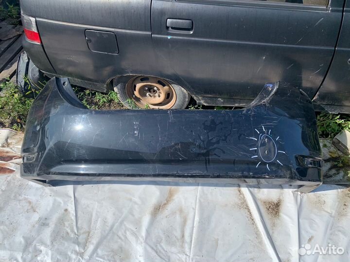 Задний бампер Toyota Corolla 180