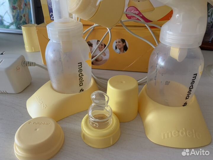 Молокоотсос электрический и ручной medela