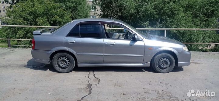 Накладка на пороги для мазда 323,фамилия, 2001-03г