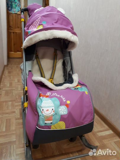 Детские санки с колесами. Санки-коляска