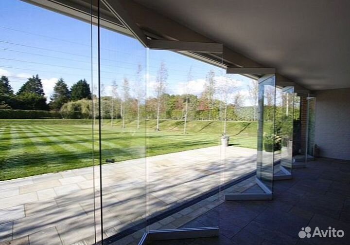 Безрамное раздвижное остекление