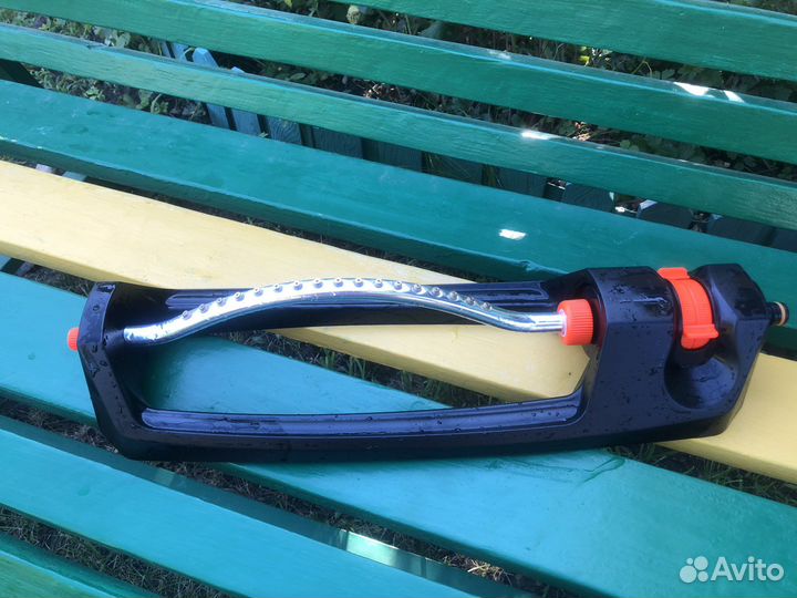 Ороситель качающийся