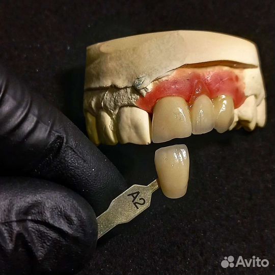 Зубной техник