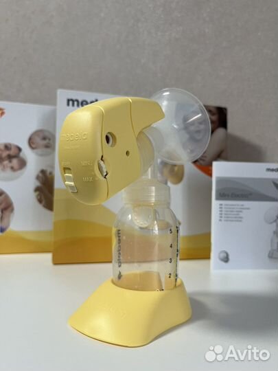 Молокоотсос medela электрический
