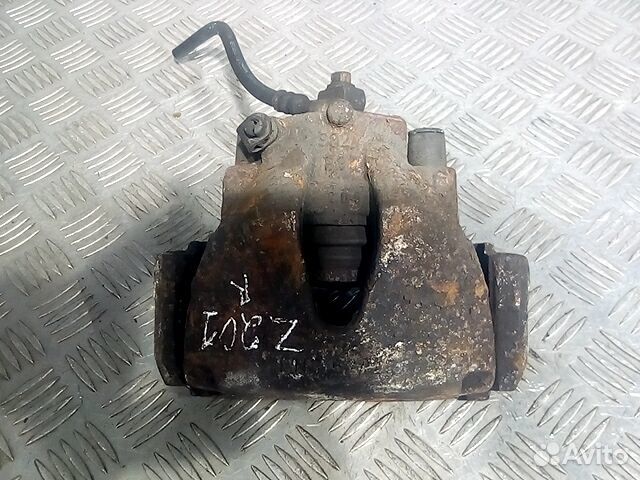 Суппорт передний правый для Opel Meriva A 93176427