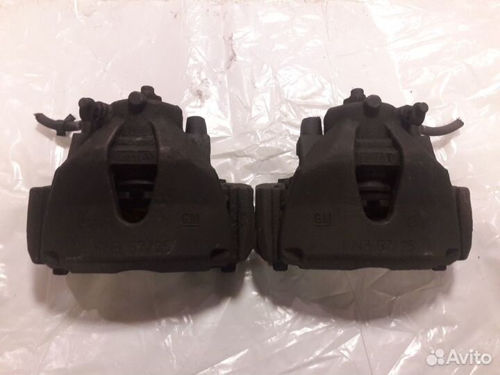 Суппорт Opel Astra H / Zafira B левый - правый