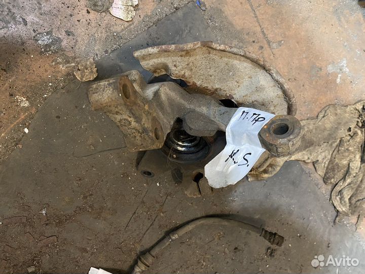 Киа спектра 2008г кулак поворотный передний левый