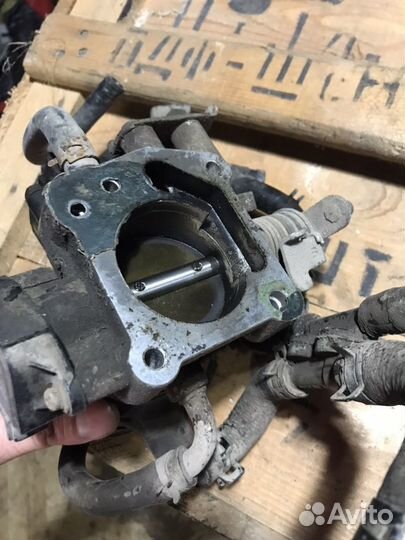 Дросельная заслонка Kia Rio 1