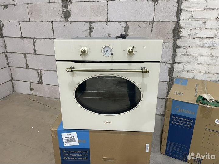 Новый духовой шкаф Midea