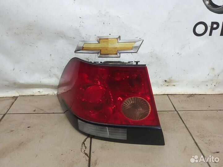 Задний левый фонарь Опель Астра Н седан