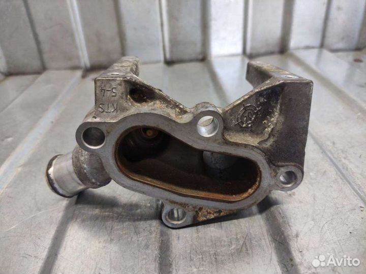 Фланец (тройник) системы охлаждения Ford Focus 2