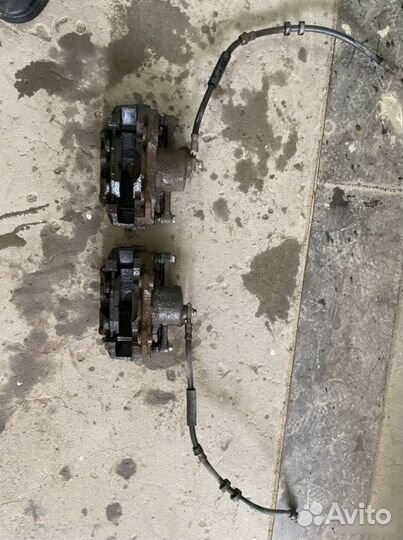 Суппорт тормозной передний Volkswagen Polo