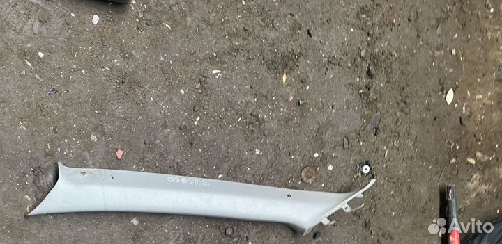 Обшивка стойки передней левой Mitsubishi Lancer 9