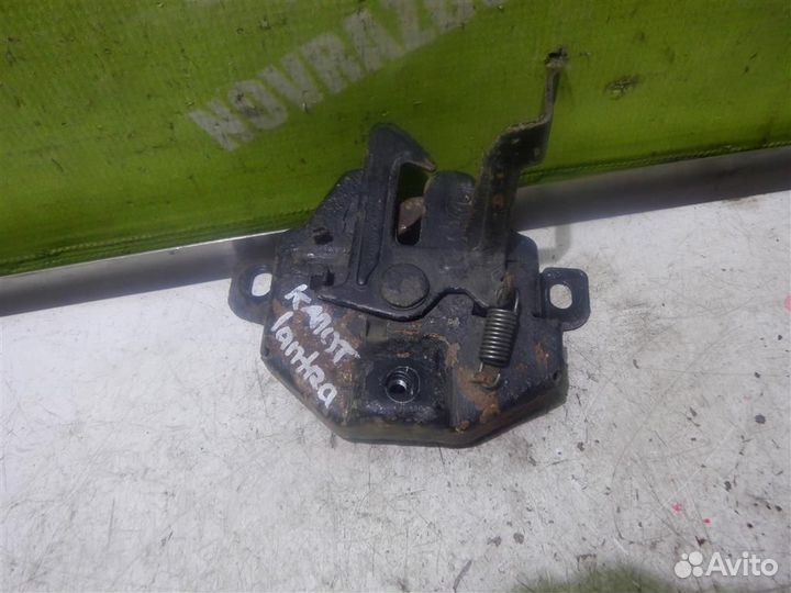 Замок капота Хендай Лантра 96-00