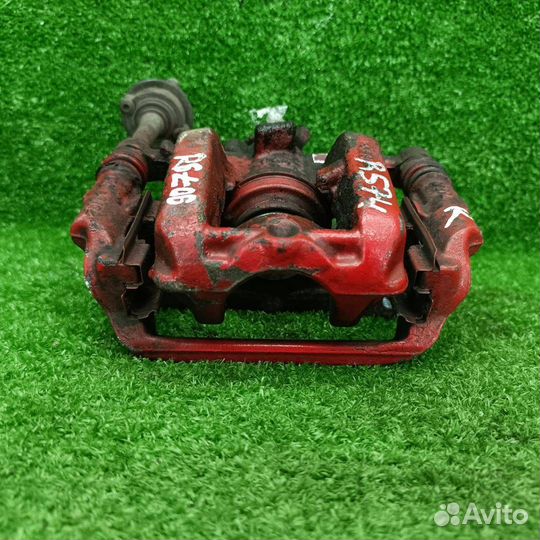 Суппорт тормозной задний правый Opel Astra J GTC