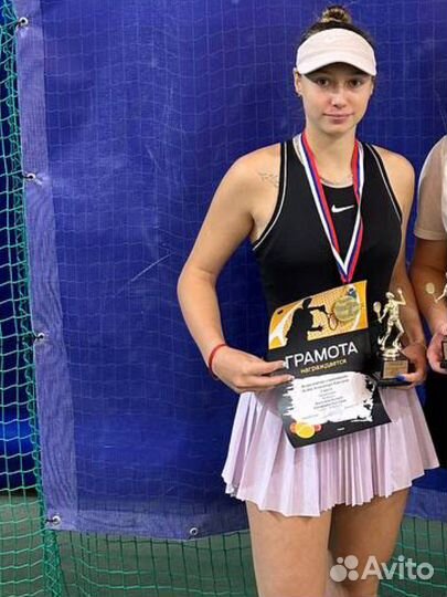 Тренер по большому теннису