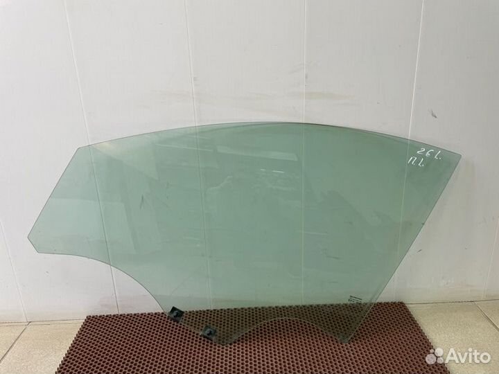 Стекло двери переднее левое Renault Logan