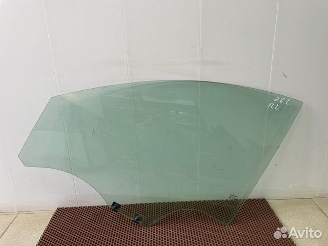 Стекло двери переднее левое Renault Logan