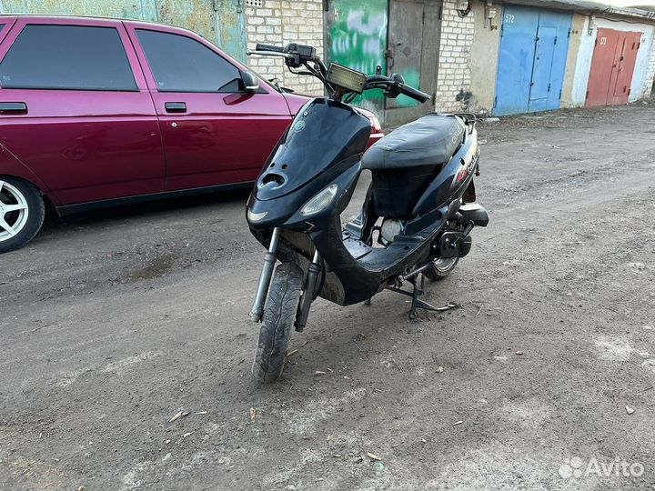 Скутер омакс