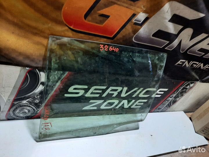 Стекло задней левой двери Skoda Fabia унив