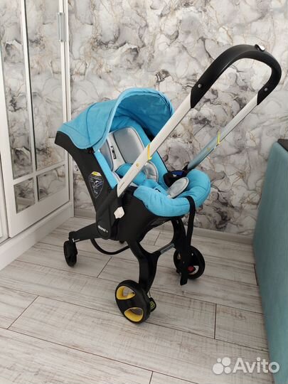 Коляска автокресло doona с базой isofix