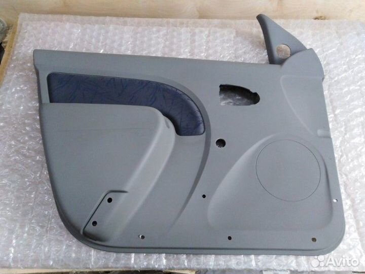 Обшивка двери передняя левая Renault Logan 2005