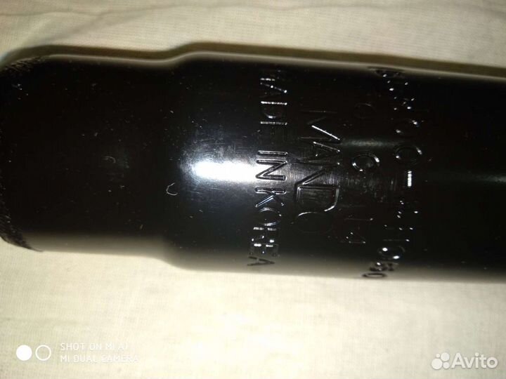 Амортизатор Mando для гранд старекс 553004H050