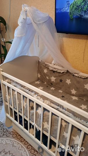 Детская кровать с маятником и ящиком