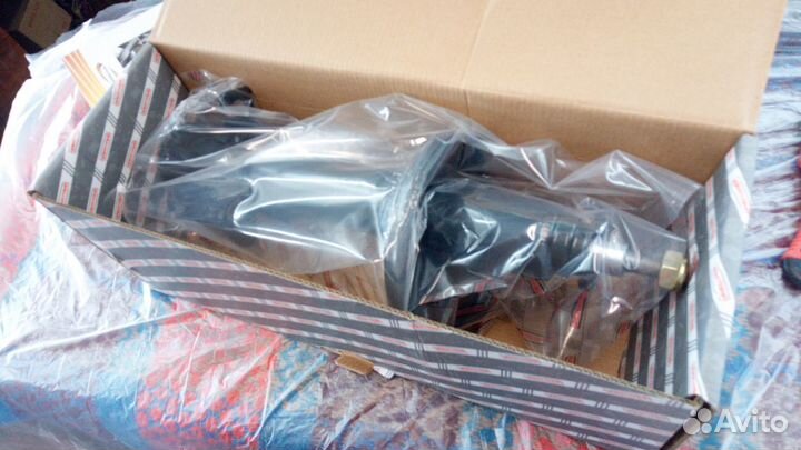 Стойка амортизатора задняя Mazda 626