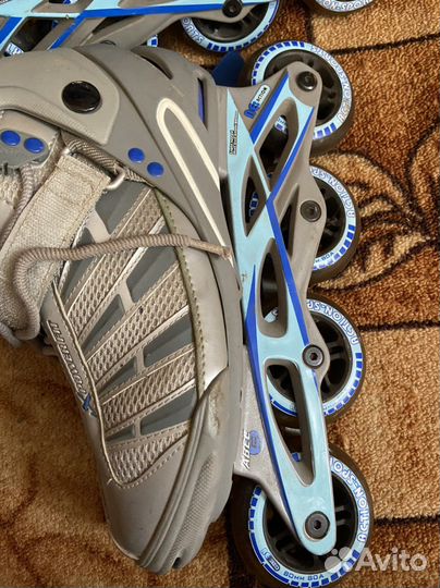 Роликовые коньки